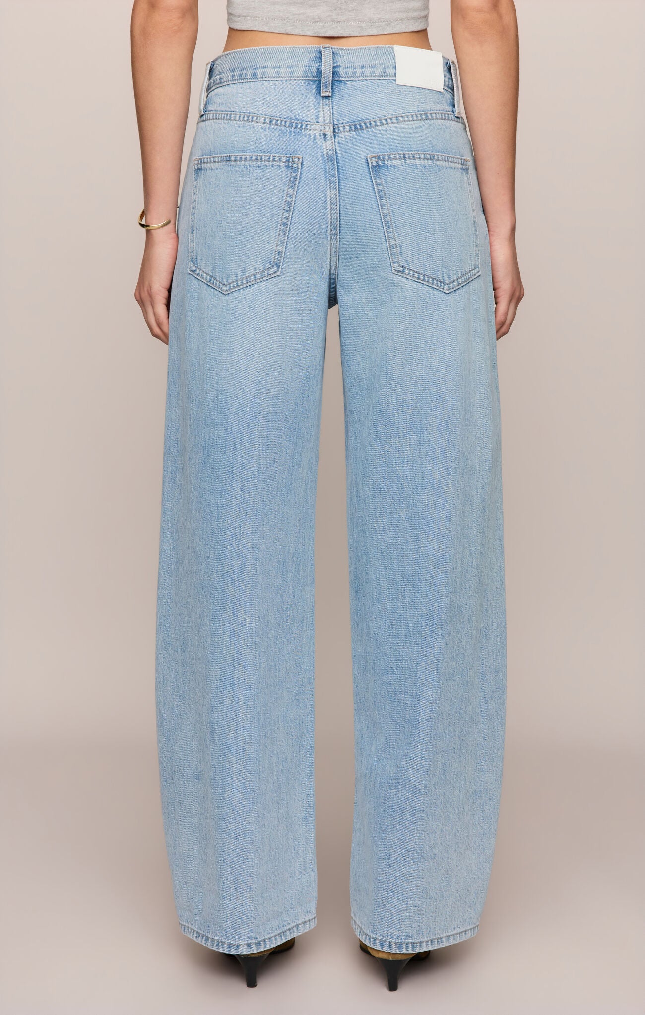 The Show Off High Rise Bowed Jean